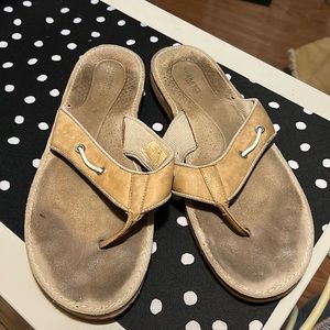 Well loved Sperry flip flops